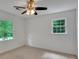 Bright bedroom features white walls and multiple windows offering natural light at 1610 Old Mill Xing, Marietta, GA 30062