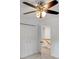 Bedroom features a ceiling fan, natural lighting, and a closet at 1610 Old Mill Xing, Marietta, GA 30062