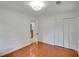 Bedroom with wooden floors and a bi-fold door closet at 1610 Old Mill Xing, Marietta, GA 30062