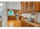 Well-appointed kitchen with granite counters, stainless appliances, and custom wood cabinets at 1610 Old Mill Xing, Marietta, GA 30062