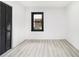 Neutral bedroom featuring modern paint colors with a closet and black trimmed window at 1853 Pinedale Pl, Decatur, GA 30032