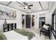 Modern bedroom features decor, ceiling fan, and artwork at 1853 Pinedale Pl, Decatur, GA 30032