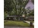 Charming house with front yard, driveway, and mature trees at 1853 Pinedale Pl, Decatur, GA 30032