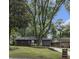Charming single-story home with lush front yard, mature tree, and a welcoming entryway at 1853 Pinedale Pl, Decatur, GA 30032