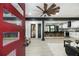 Open-concept living space flows into the remodeled kitchen with modern finishes, and features an open entry with a stylish front door at 1853 Pinedale Pl, Decatur, GA 30032