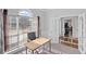 Inviting home office with large window, neutral carpeting, and ample natural light at 4021 Melvin Sw Dr, Atlanta, GA 30331