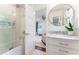 Modern bathroom features a glass-enclosed shower next to bedroom at 4095 N Broadland Nw Rd, Atlanta, GA 30342