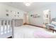 Charming Bedroom with decorative accents and view to bright bathroom at 4095 N Broadland Nw Rd, Atlanta, GA 30342