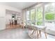Sunlit breakfast nook with large windows and a view of the backyard at 4095 N Broadland Nw Rd, Atlanta, GA 30342