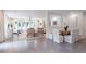 Spacious living room with tile floors, ample seating, and natural light at 4095 N Broadland Nw Rd, Atlanta, GA 30342