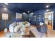 Cozy blue living room featuring stylish furniture and modern decor for comfortable living at 4095 N Broadland Nw Rd, Atlanta, GA 30342