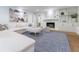 Bright and spacious living room with a sectional sofa and contemporary decor at 4095 N Broadland Nw Rd, Atlanta, GA 30342