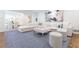 Inviting living room with a comfortable sofa, ottoman, and stylish decor at 4095 N Broadland Nw Rd, Atlanta, GA 30342