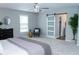Primary bedroom with large walk-in closet and an ensuite bath at 909 Ne Otter Way Ne Way, Marietta, GA 30068