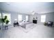 Bedroom with neutral color palette, plush carpet, and windows for natural light at 909 Ne Otter Way Ne Way, Marietta, GA 30068