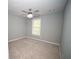 This secondary bedroom has plush carpet and natural light at 909 Ne Otter Way Ne Way, Marietta, GA 30068