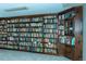 Spacious custom wooden bookcase full of books adding to the room's charm at 909 Ne Otter Way Ne Way, Marietta, GA 30068