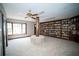 Room includes a large wall of bookshelves, bay window, and unique support beam feature at 909 Ne Otter Way Ne Way, Marietta, GA 30068