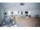 Bright living room with vaulted ceiling, large windows, neutral colors, and modern furniture at 909 Ne Otter Way Ne Way, Marietta, GA 30068