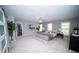 Spacious main bedroom with stylish decor, soft natural light, and modern ceiling fan at 909 Ne Otter Way Ne Way, Marietta, GA 30068