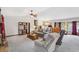 Bright living room featuring neutral-toned furniture, vaulted ceilings, and natural light at 1159 Midland Nw Dr, Acworth, GA 30102
