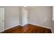Bedroom with wood floors, ceiling fan, and large closet at 123 Arnold Pl, Jonesboro, GA 30236