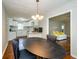 Bright dining room adjacent to an open kitchen and cozy living area at 123 Arnold Pl, Jonesboro, GA 30236