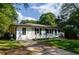 Well-maintained home exterior with a large front yard at 123 Arnold Pl, Jonesboro, GA 30236