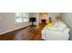 Inviting living room showcasing hardwood floors and an open layout to the dining room at 123 Arnold Pl, Jonesboro, GA 30236