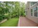 Spacious deck overlooking the backyard with lush greenery and privacy fence at 2427 Camata, Marietta, GA 30066