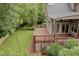 The backyard features a deck that offers a tranquil view of the garden and patio at 2427 Camata, Marietta, GA 30066