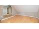 Bedroom with hardwood floors, neutral paint, and access to closet space at 2427 Camata, Marietta, GA 30066