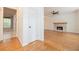 Bright living room with hardwood floors, fireplace, and ample natural light streaming through windows at 2427 Camata, Marietta, GA 30066