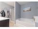 Bathroom showcases a soaking tub, walk-in shower, stylish fixtures, and decor at 3931 Fireoak Dr, Decatur, GA 30032