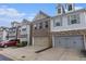 Street view of well-maintained townhomes, featuring a brick and siding facade at 3931 Fireoak Dr, Decatur, GA 30032
