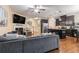 Open-concept living room and kitchen with hardwood floors and modern furnishings at 3931 Fireoak Dr, Decatur, GA 30032