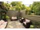 Outdoor deck furnished with comfortable seating, a heat lamp, and greenery, perfect for entertaining at 796 Piedmont Ne Way, Atlanta, GA 30324