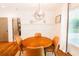 Elegant dining room featuring modern chandelier, seating for four, and natural light at 796 Piedmont Ne Way, Atlanta, GA 30324