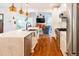 Open-concept kitchen with marble countertops, stainless steel appliances, and hardwood floors at 796 Piedmont Ne Way, Atlanta, GA 30324