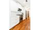 Chef's kitchen with stainless steel appliances, white cabinetry, and marble countertops at 796 Piedmont Ne Way, Atlanta, GA 30324
