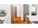 Bright kitchen featuring stainless steel appliances, white cabinetry, and hardwood floors at 796 Piedmont Ne Way, Atlanta, GA 30324