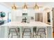 Bright kitchen with white marble countertop island, stainless steel appliances, and stylish pendant lighting at 796 Piedmont Ne Way, Atlanta, GA 30324