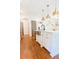 Spacious kitchen island with stainless steel sink, marble countertops, and modern pendant lighting at 796 Piedmont Ne Way, Atlanta, GA 30324