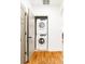 Laundry closet featuring a stacked washer and dryer unit at 796 Piedmont Ne Way, Atlanta, GA 30324
