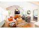 Charming living room with brick accent wall, stylish decor, and natural light at 796 Piedmont Ne Way, Atlanta, GA 30324