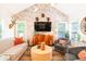 Beautiful living room featuring a brick accent wall, modern furniture, and elegant decor at 796 Piedmont Ne Way, Atlanta, GA 30324