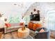 Elegant living room with brick wall, modern lighting, and comfortable seating arrangement at 796 Piedmont Ne Way, Atlanta, GA 30324