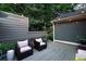 Outdoor patio with comfortable seating and atmospheric lighting at 796 Piedmont Ne Way, Atlanta, GA 30324
