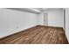 Unfinished basement with gray vinyl flooring and neutral-painted walls at 90 Lake Avalon Ct, Dallas, GA 30157
