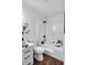 Updated bathroom featuring new tile, a shower-tub combination, and modern fixtures at 90 Lake Avalon Ct, Dallas, GA 30157